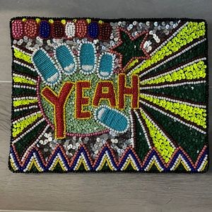 Multi color beaded envelope purse.